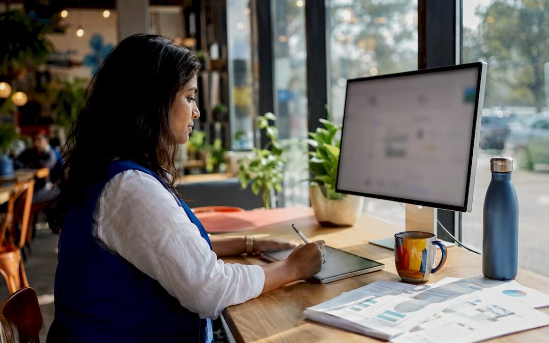 Woman managing personalised email campaigns in home office