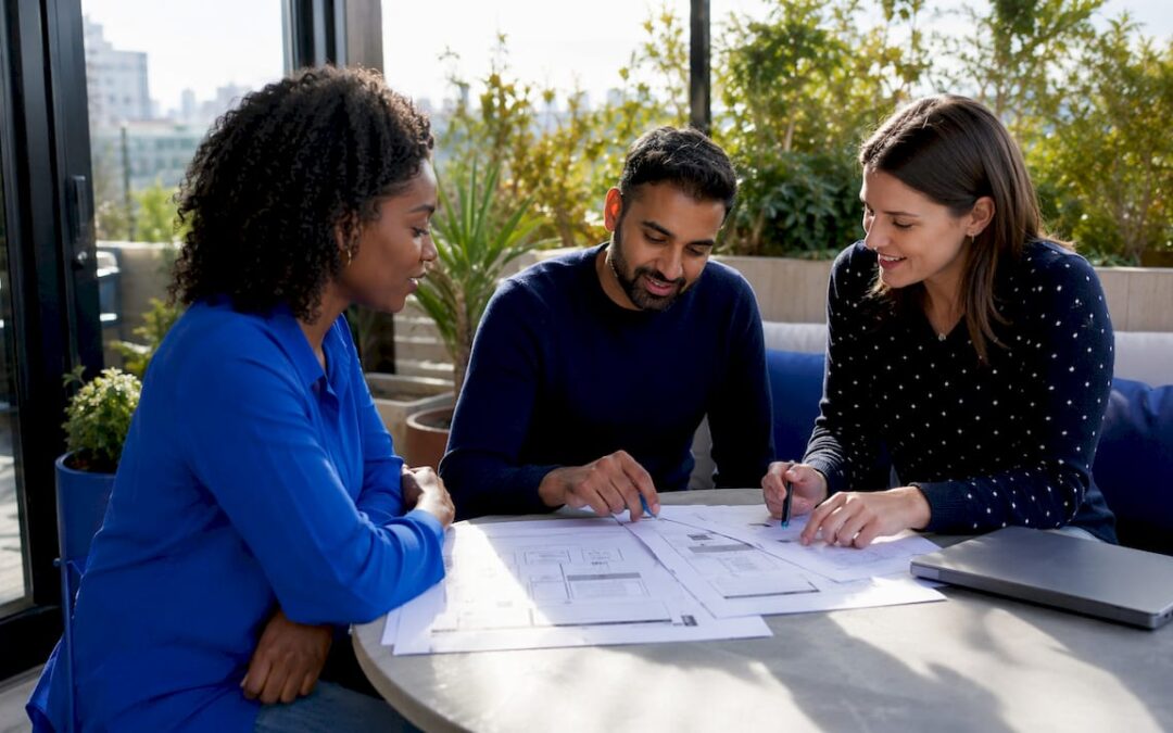Team planning website redesign in office