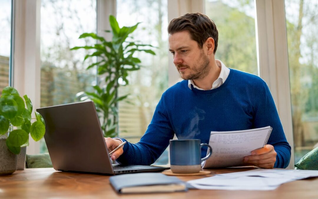 Small business owner using a self-service portal laptop